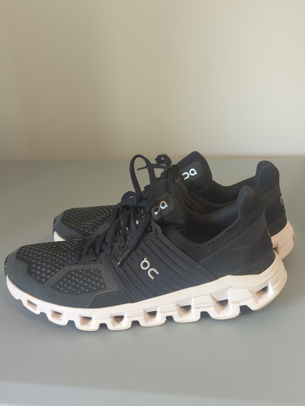 On Running Women's Black and White Cloudflow Athletic Shoes